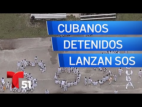 Cubanos en centro de detención de Krome se manifiestan con señal de SOS